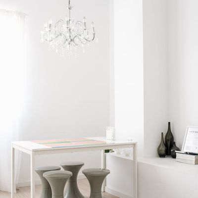 An empty, bright and spacious studio with wooden floors.